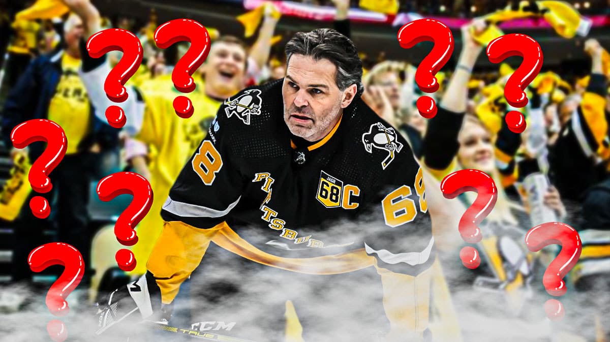 Jaromir Jagr in a Pittsburgh Penguins uniform. Penguins fans in background. Question marks all over