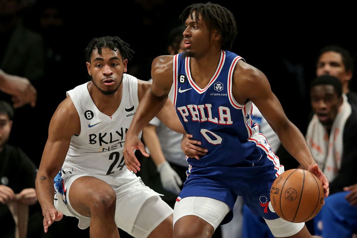 Philadelphia 76ers guard Tyrese Maxey (0) controls the ball against Brooklyn Nets guard Cam Thomas (24) during the fourth quarter at Barclays Center. 