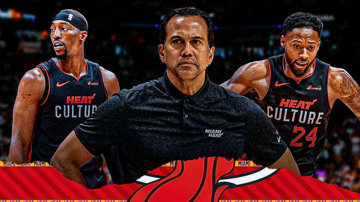 Miami Heat head coach Erik Spoelstra in the middle of stars Bam Adebayo and Haywood Highsmith in front of the Kaseya Center.