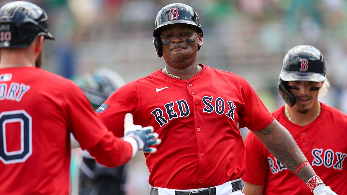 Mar 17, 2024; Fort Myers, Florida, USA; Boston Red Sox third baseman Rafael Devers (11) runs the bases after hitting a two-run home run against the New York Yankees in the first inning at JetBlue Park at Fenway South. 