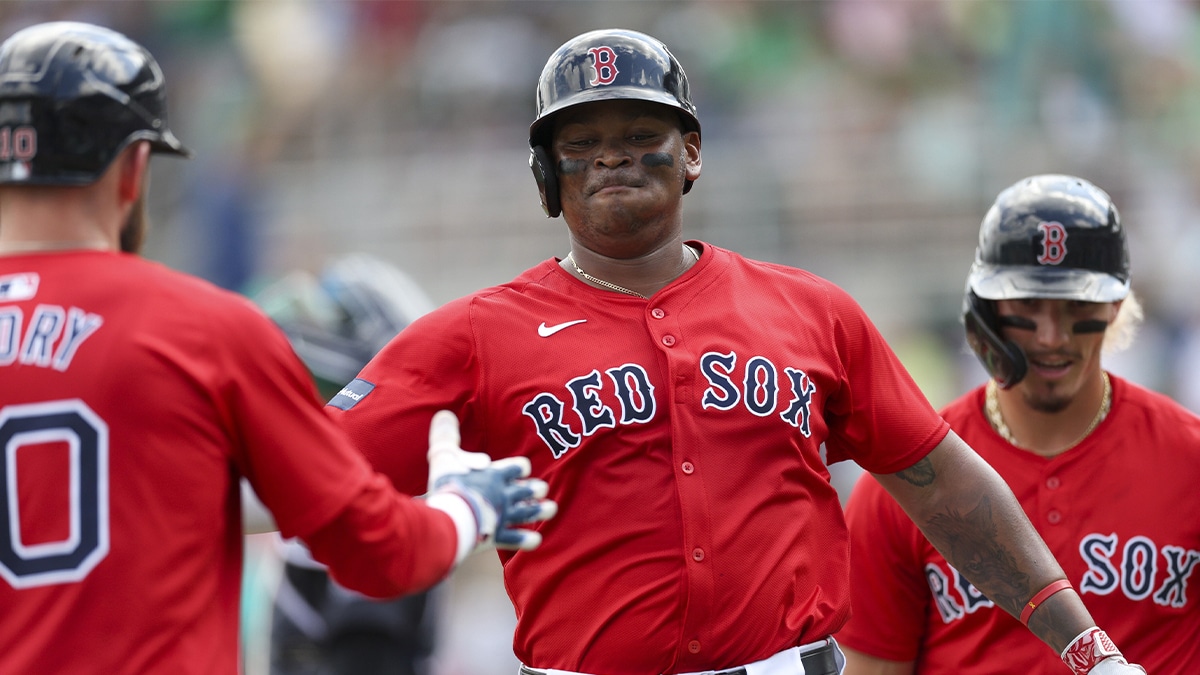 Boston Red Sox third baseman Rafael Devers (11) runs the bases after hitting a two-run home run against the New York Yankees in the first inning at JetBlue Park at Fenway South.
