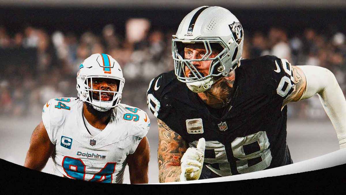 Christian Wilkins looking at Raiders Maxx Crosby.