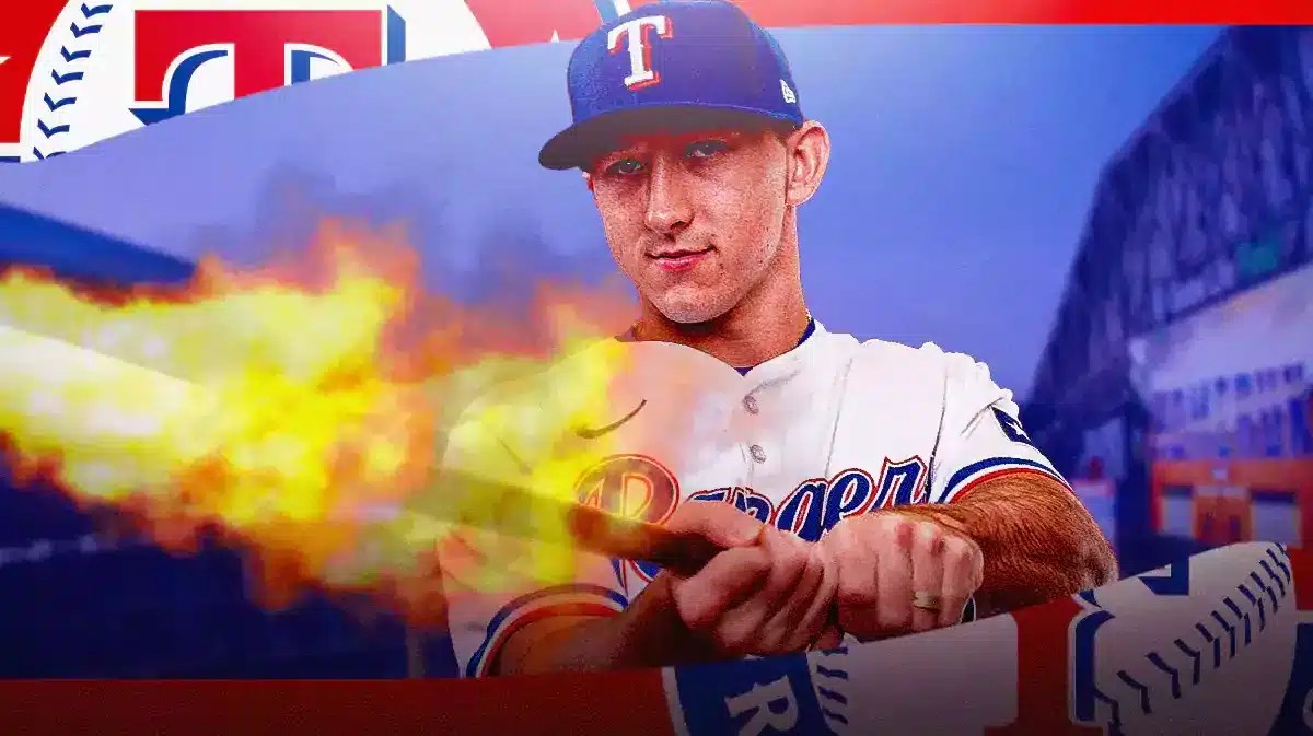Rangers' Wyatt Langford swinging a baseball bat. Fire coming off the bat please.