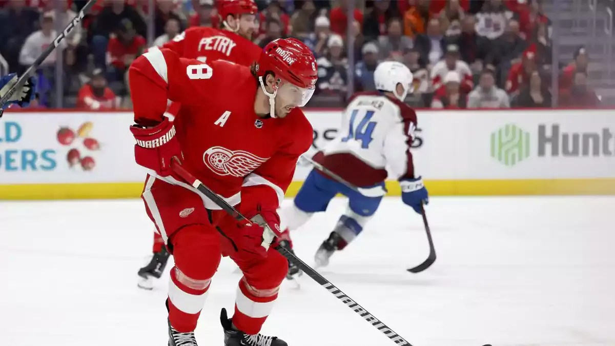 Detroit Red Wings defenseman Ben Chiarot (8) skates with the puck in the third period against the Colorado Avalanche at Little Caesars Arena.