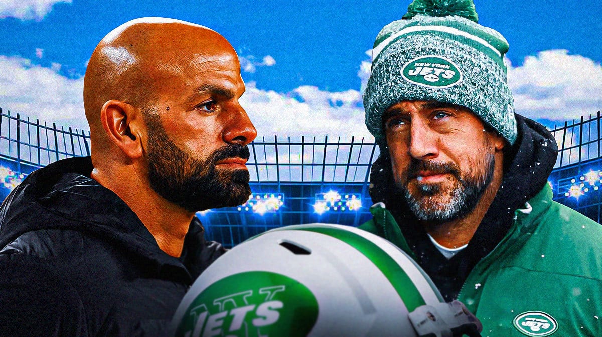 New York Jets head coach Robert Saleh next to Aaron Rodgers in front of MetLife Stadium.