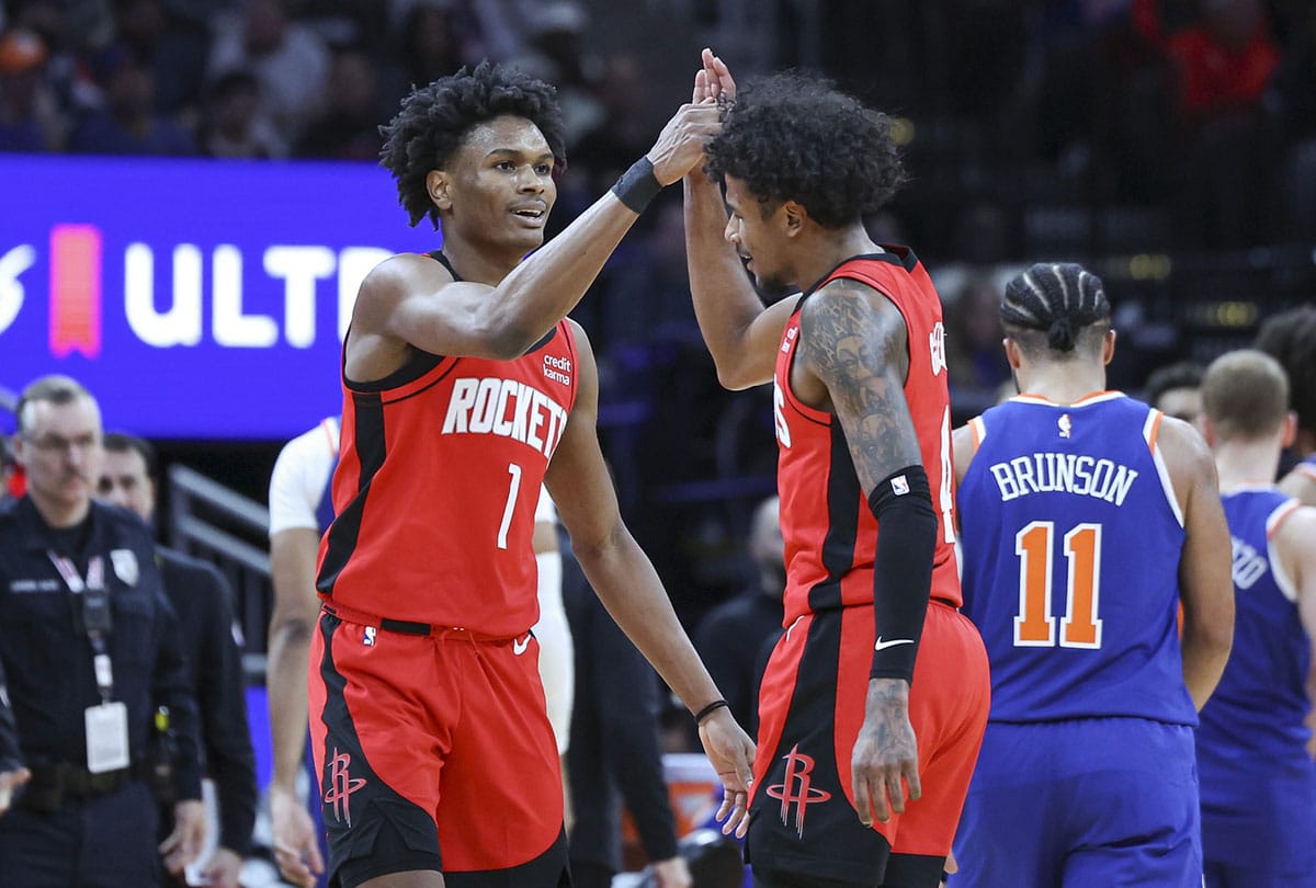 Houston Rockets forward Amen Thompson (1) and guard Jalen Green (4) celebrate after a play during the second quarter against the New York Knicks at Toyota Center