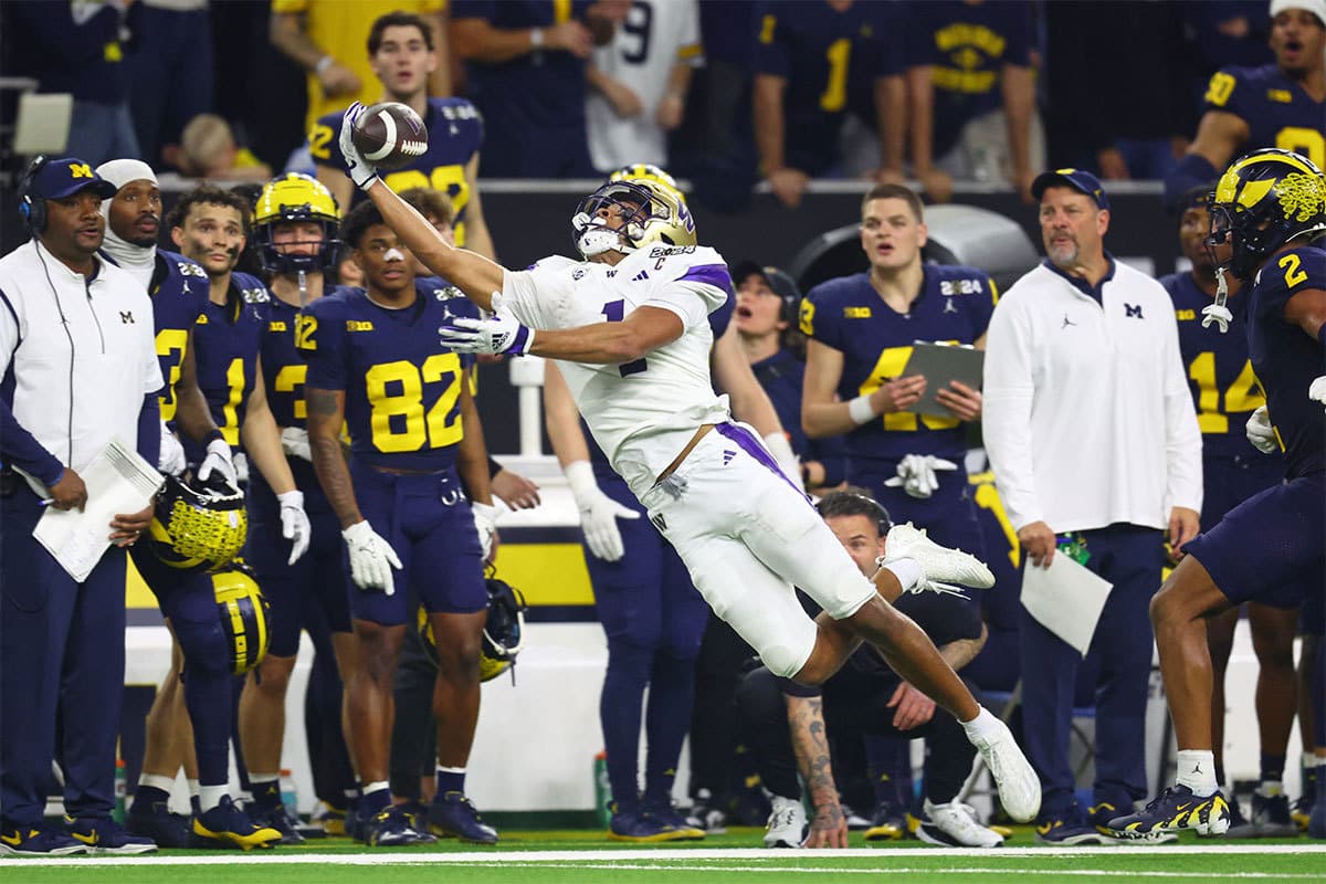 Washington Huskies wide receiver Rome Odunze (1) is unable to make a catch against the Michigan Wolverines during the third quarter in the 2024 College Football Playoff national championship game at NRG Stadium