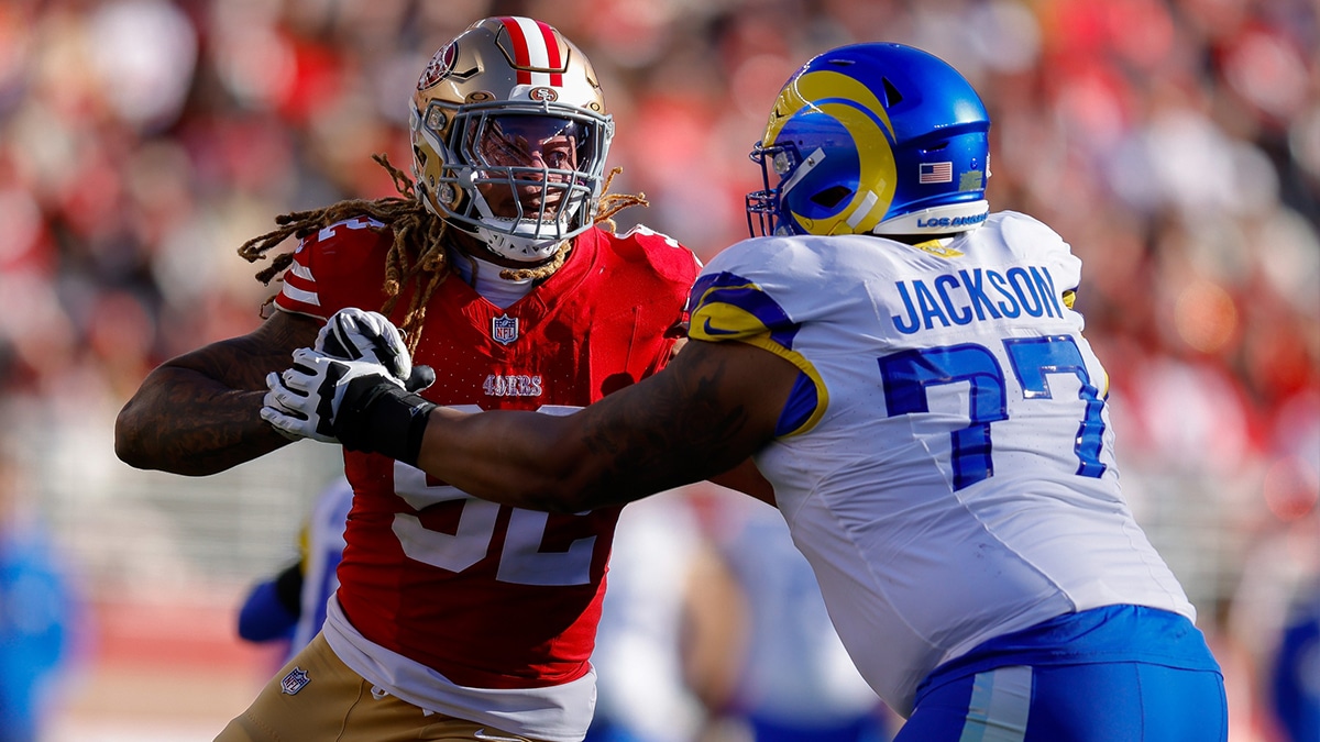  San Francisco 49ers defensive end Chase Young (92) rushes the passer against Los Angeles Rams offensive tackle Alaric Jackson (77) during the second quarter at Levi's Stadium