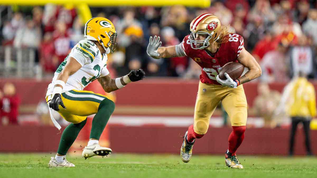 San Francisco 49ers tight end George Kittle (85) runs against Green Bay Packers safety Jonathan Owens (34) 