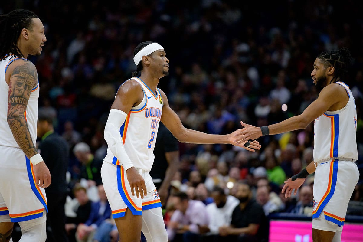 Oklahoma City Thunder guard Shai Gilgeous-Alexander (2) celebrates a score with Oklahoma City Thunder guard Isaiah Joe (11) during the first half against the New Orleans Pelicans at Smoothie King Center. 