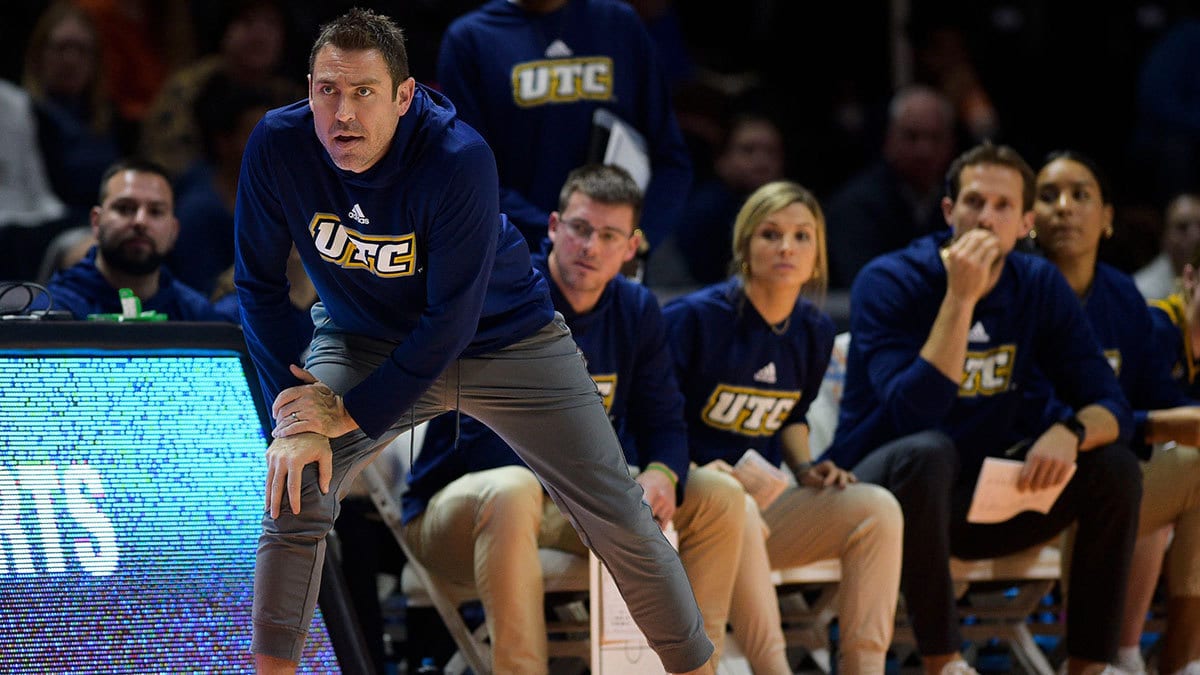 Chattanooga Head Coach Shawn Poppie eyes the game between Tennessee and Chattanooga