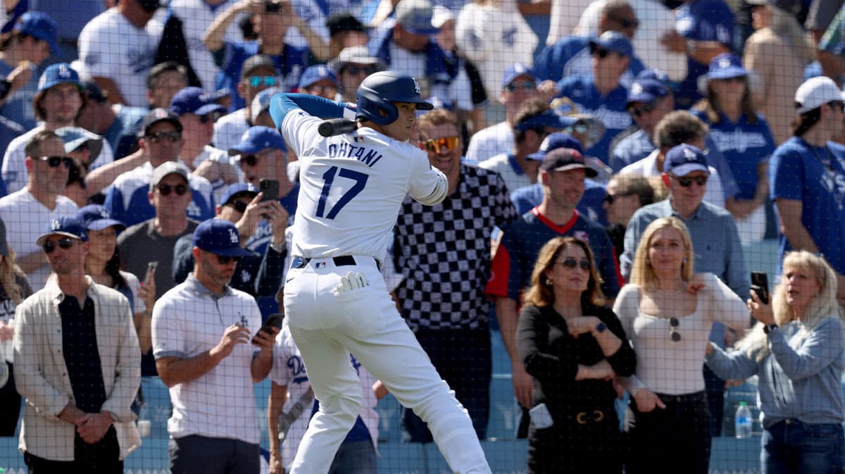 Los Angeles Dodgers designated hitter Shohei Ohtani (17) waits to bat during the seventh inning of an opening day game against the St. Louis Cardinals at Dodger Stadium.
