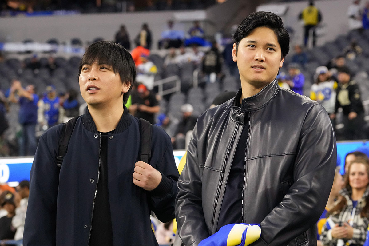 Los Angeles Dodgers player Shohei Ohtani (right) and interpreter Ippei Mizuhara attend the game between the Los Angeles Rams and the New Orleans Saints at SoFi Stadium.