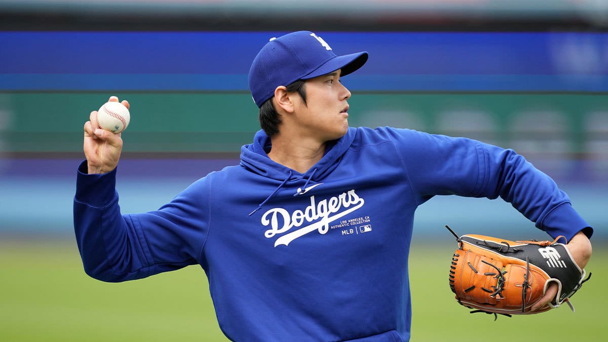 Los Angeles Dodgers designated hitter Shohei Ohtani throws before the game against the Los Angeles Angels at Dodger Stadium