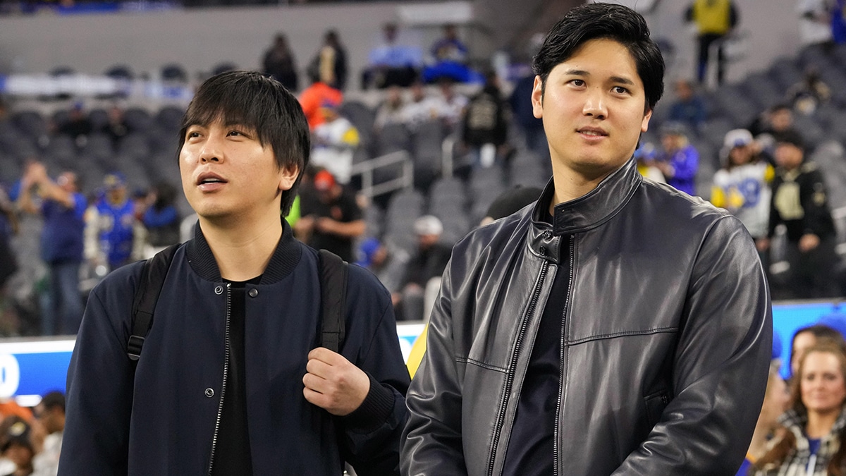 Los Angeles Dodgers player Shohei Ohtani (right) and interpreter Ippei Mizuhara attend the game between the Los Angeles Rams and the New Orleans Saints at SoFi Stadium