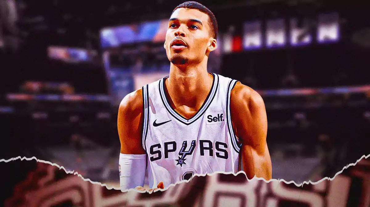 Victor Wembanyama with the Spurs arena in the background