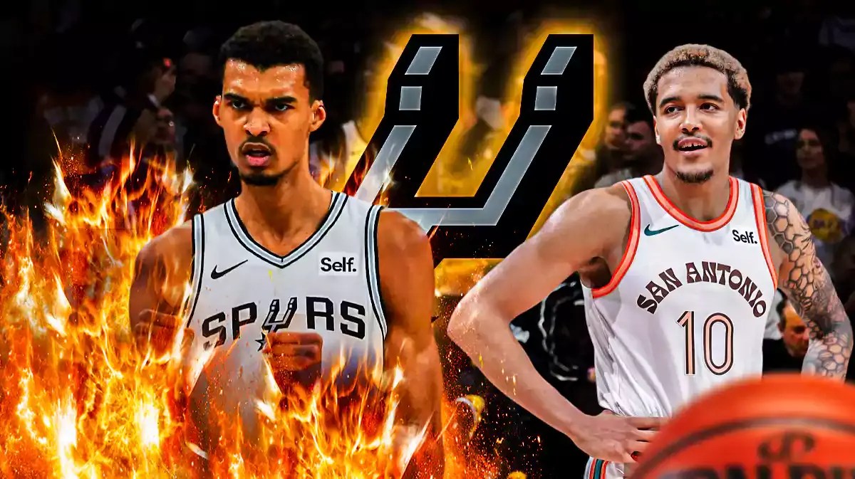 Victor Wembanyama in image with fire around him, Jeremy Sochan in image looking impressed, SA Spurs logo, basketball court in background