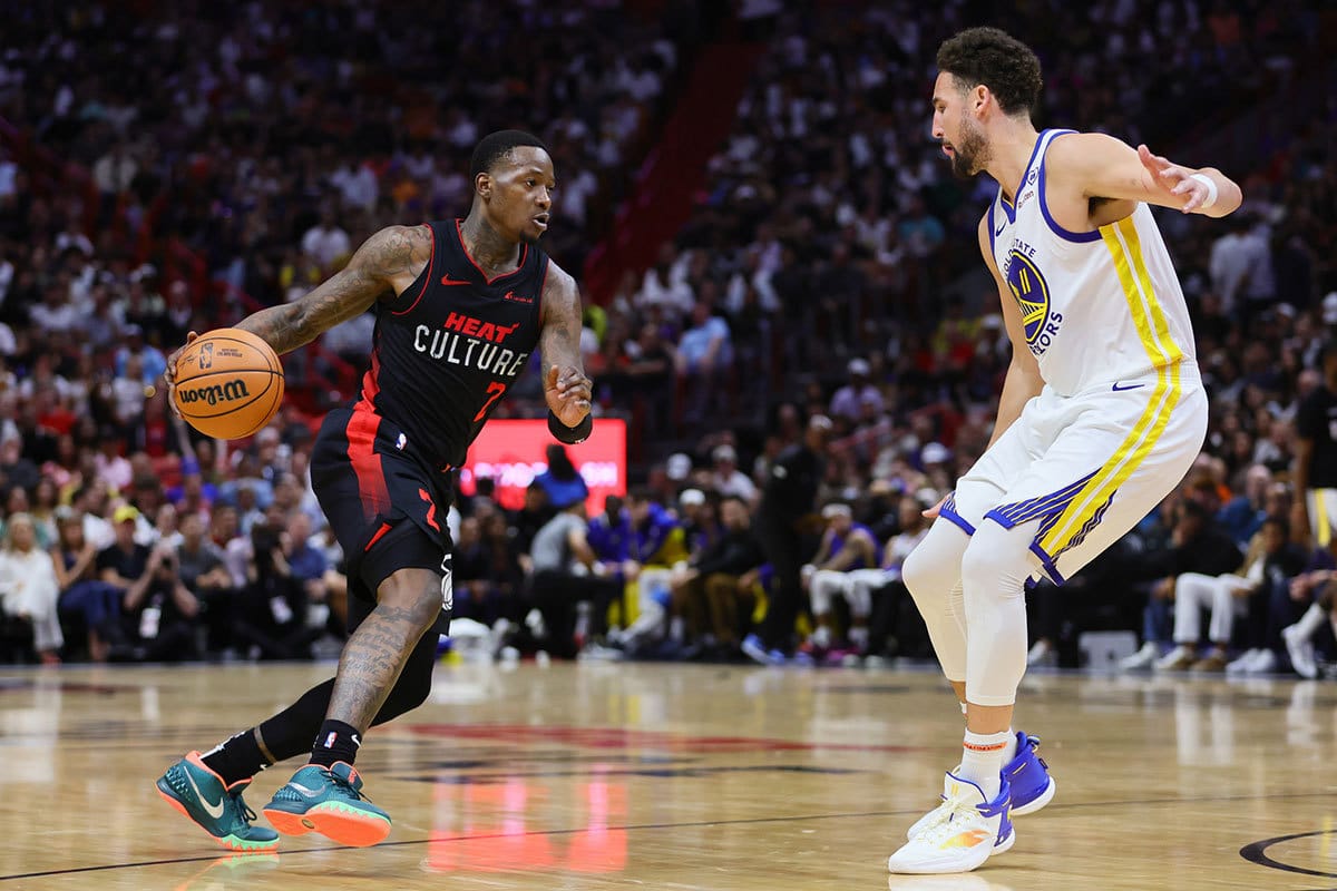 Miami Heat guard Terry Rozier (2) drives to the basket against Golden State Warriors guard Klay Thompson (11) during the third quarter at Kaseya Center.
