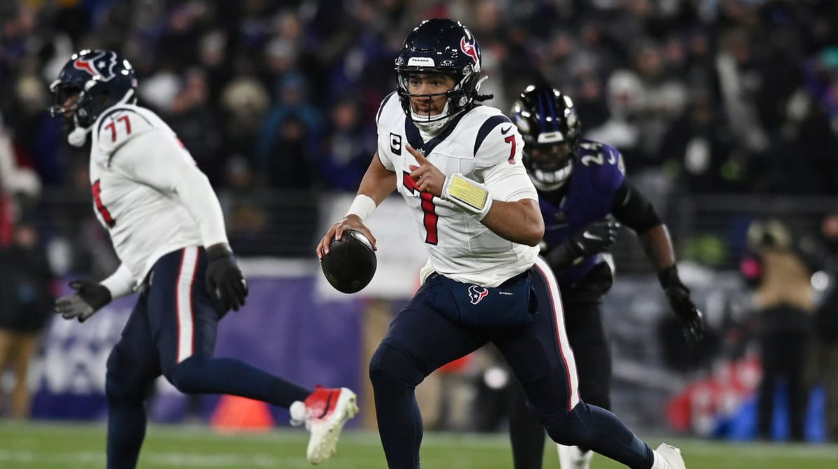 Houston Texans quarterback C.J. Stroud (7) runs the ball against the Baltimore Ravens during the second quarter of a 2024 AFC divisional round game at M&T Bank Stadium
