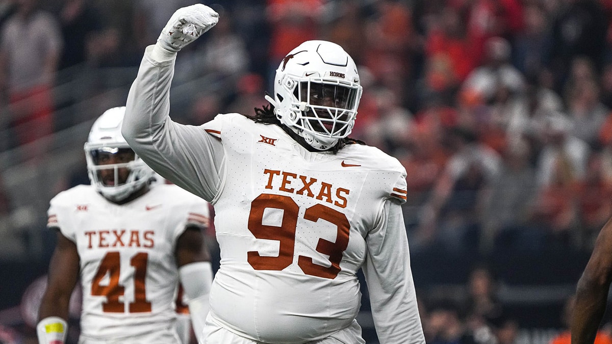 Texas Longhorns defensive lineman T'Vondre Sweat (93) celebrates a defensive stop during the Big 12 Championship game against the Oklahoma State Cowboys at AT&T stadium on Saturday, Dec. 2, 2023 in Arlington.