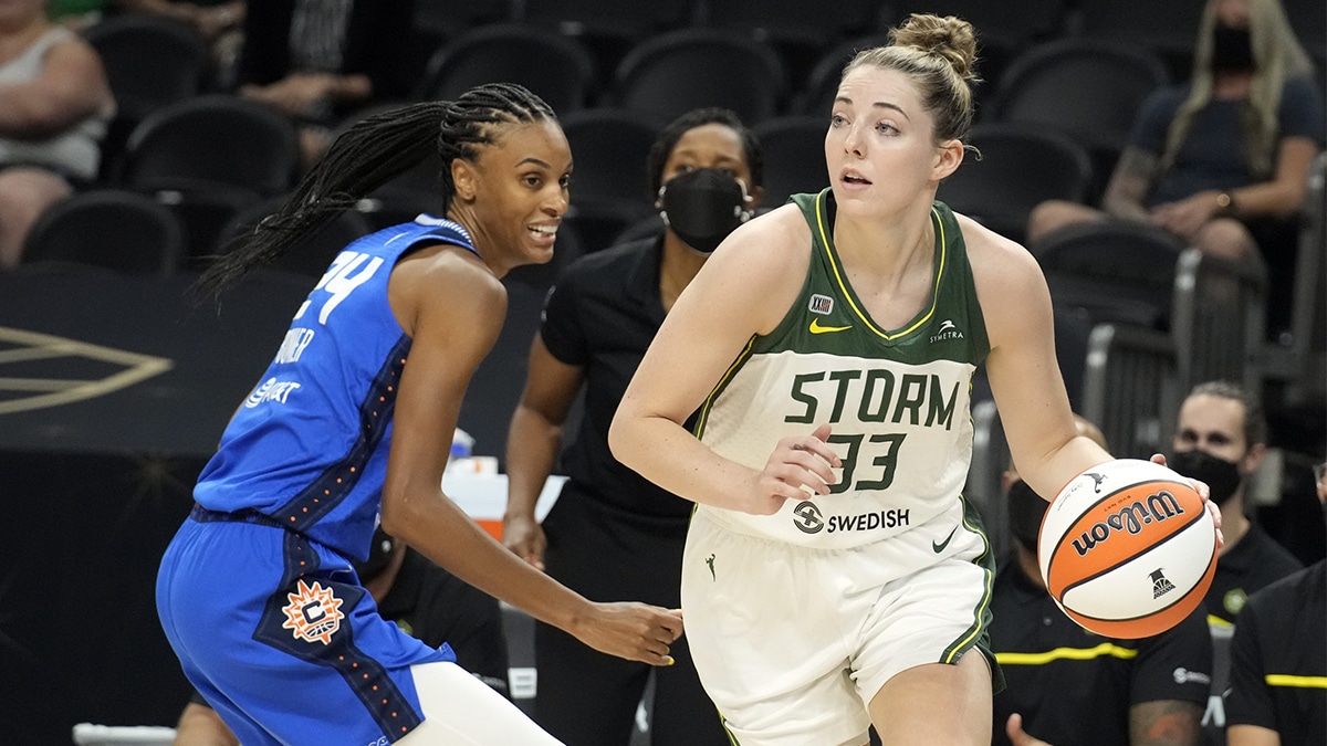 Seattle Storm forward Katie Lou Samuelson (33) drives against Connecticut Sun guard DeWanna Bonner (24) in the first half during the Inaugural WNBA Commissioners Cup Championship Game