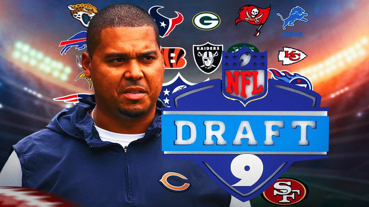 Bears GM Ryan Poles holdig an NFL Draft logo with the number 9 on it and all the NFL team logos in the background