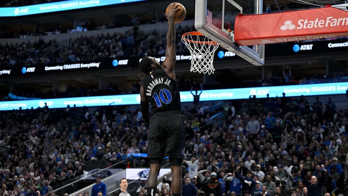Dallas Mavericks forward Tim Hardaway Jr. (10) dunks the ball against the Milwaukee Bucks during the second quarter at the American Airlines Center. 