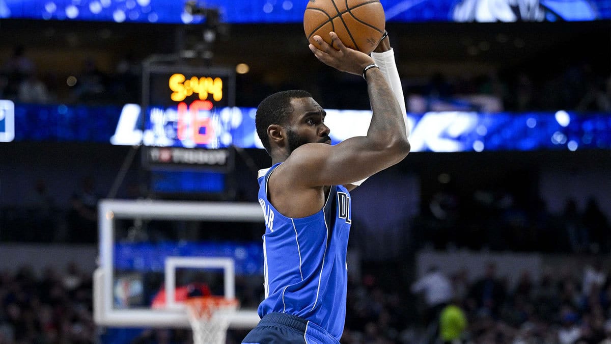 Dallas Mavericks forward Tim Hardaway Jr. (10) makes a three point jump shot against the Orlando Magic during the second half at the American Airlines Center.