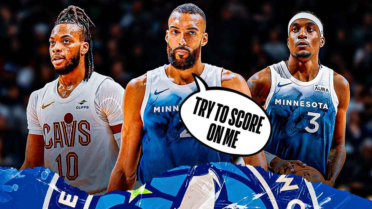 Rudy Gobert in the center saying, “try to score on me” and Jaden McDaniels and Darius Garland off to the side.