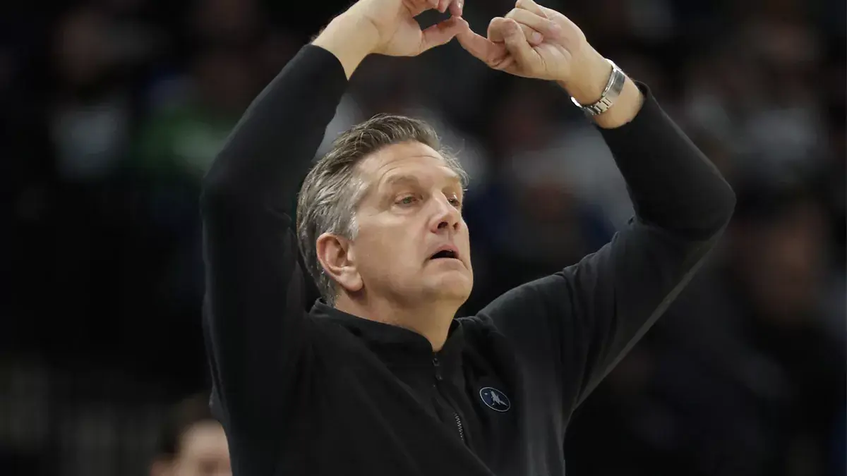 Minnesota Timberwolves head coach Chris Finch directs his team as they play the Memphis Grizzlies in the third quarter at Target Center.