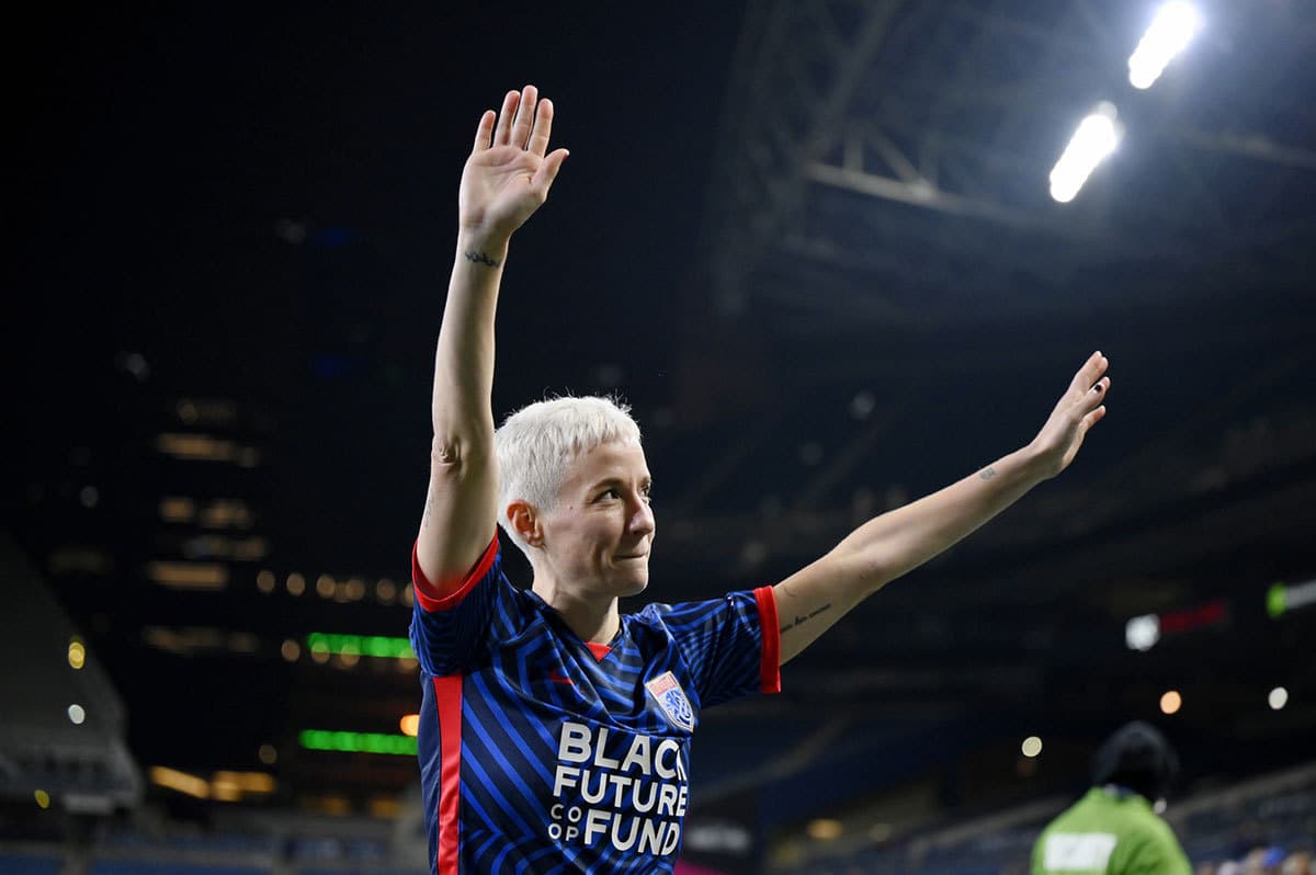 OL Reign forward Megan Rapinoe (15) acknowledges fans as she exits the field after their win against Angel City FC and her last home game