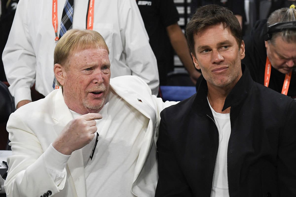 Las Vegas Aces owner Mark Davis and part-owner Tom Brady talk before the game between the Las Vegas Aces and the New York Liberty during game one of the 2023 WNBA Finals at Michelob Ultra Arena.