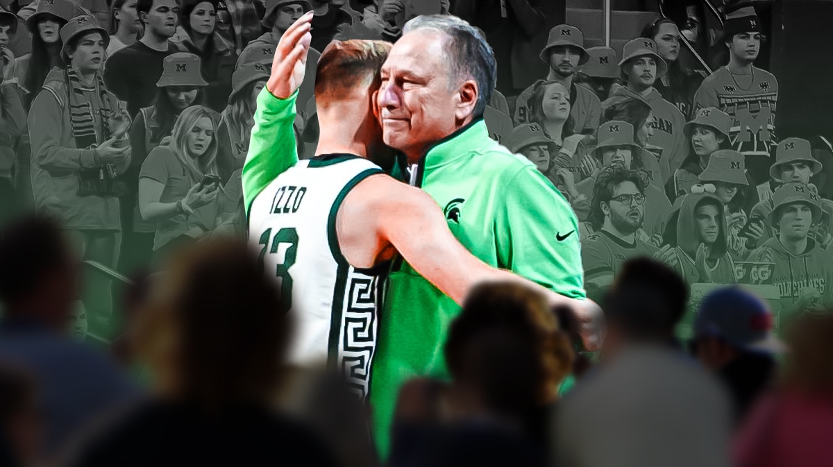 Michigan State basketball coach Tom Izzo and Steven Izzo embrace