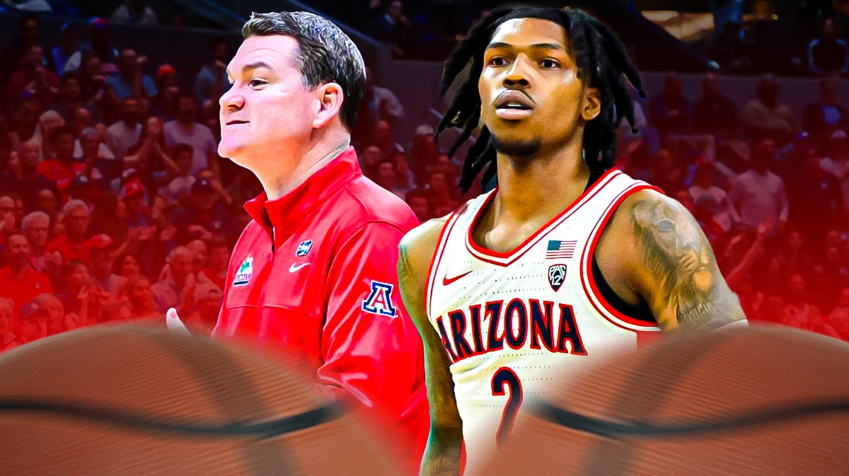 Arizona basketball coach Tommy Lloyd next to Caleb Love.