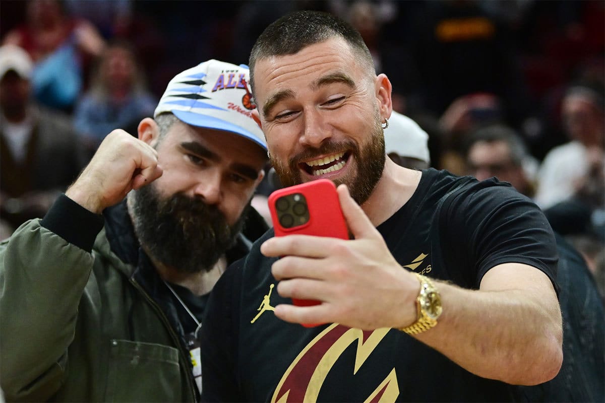Cleveland natives and NFL players Travis, right, and Jason Kelce celebrate after the Cleveland Cavaliers beat the Boston Celtics during the second half at Rocket Mortgage FieldHouse