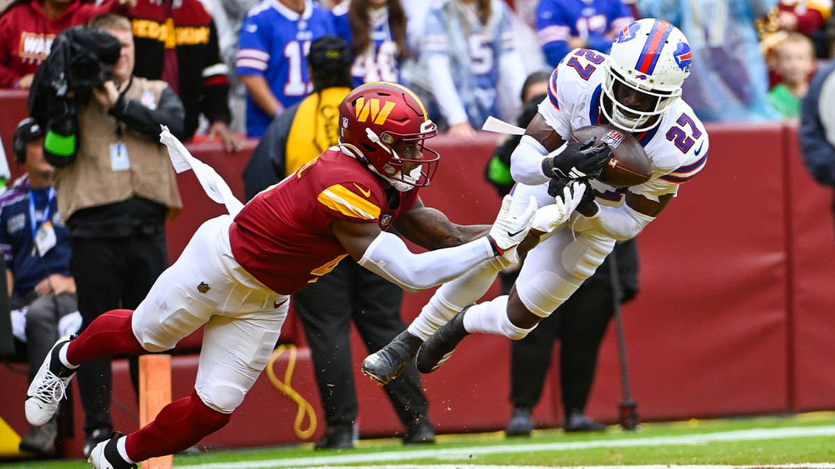 Buffalo Bills cornerback Tre'Davious White (27) intercepts a pass intended for Washington Commanders wide receiver Curtis Samuel (4) during the second half at FedExField.