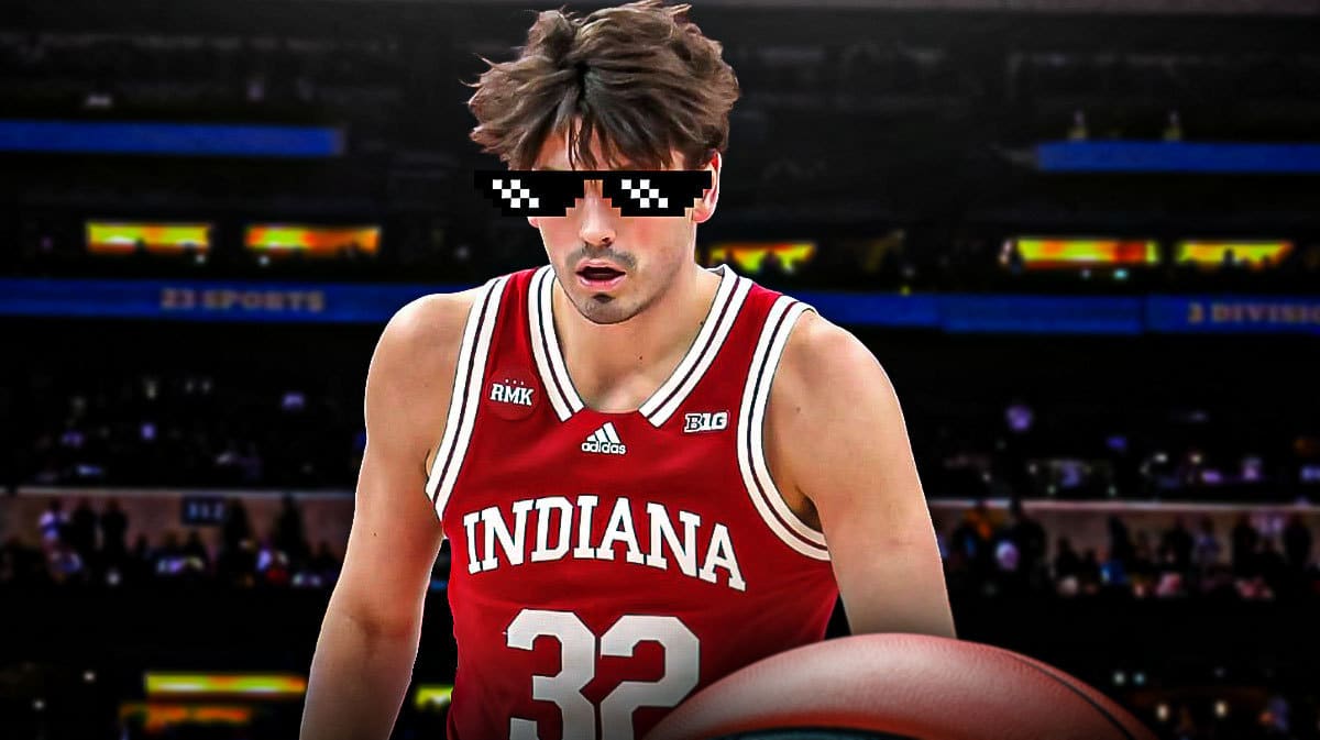 Trey Galloway (Indiana basketball) with Indiana hoosiers mascot in the background