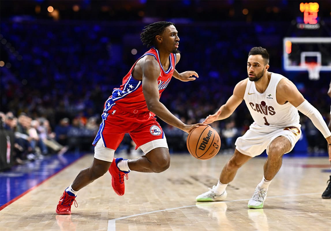 Philadelphia 76ers guard Tyrese Maxey (0) drives against Cleveland Cavaliers guard Max Strus (1) in the third quarter at Wells Fargo Center. 