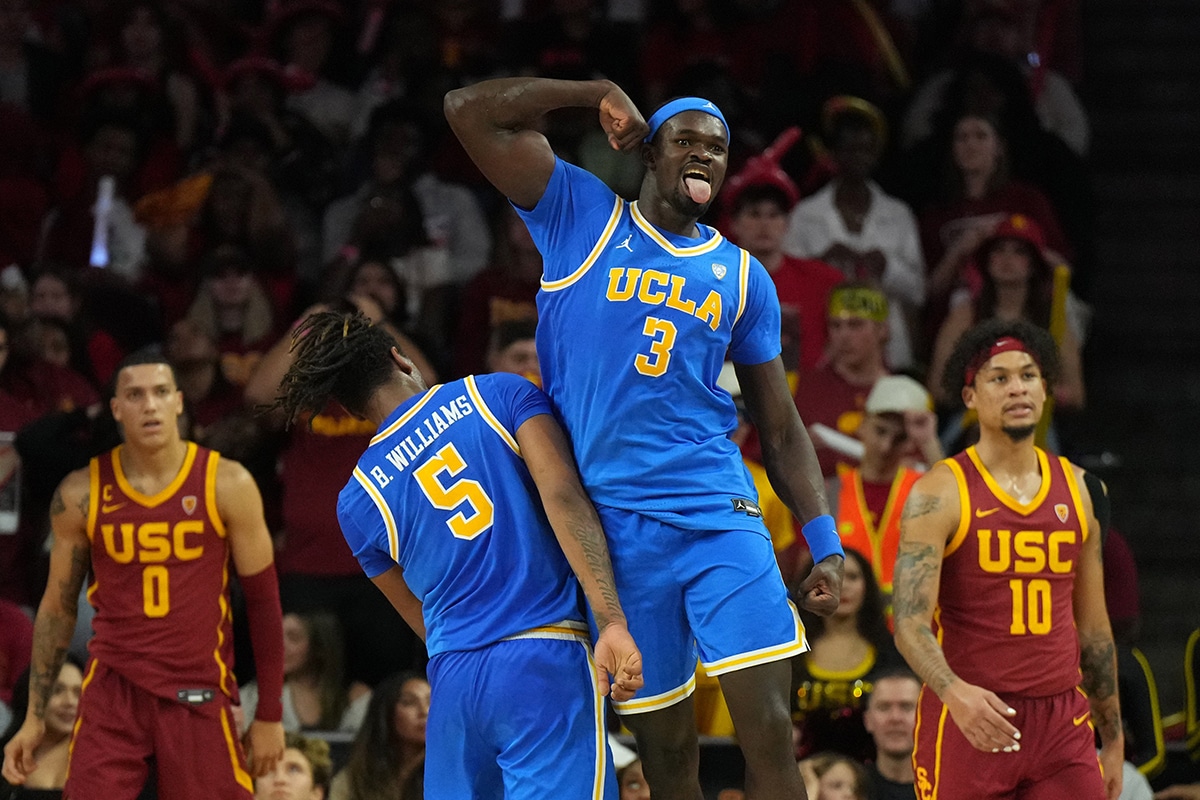 UCLA Bruins forward Adem Bona (3) and guard Brandon Williams (5) celebrate against the UCLA Bruins in the second half at Galen Center. 