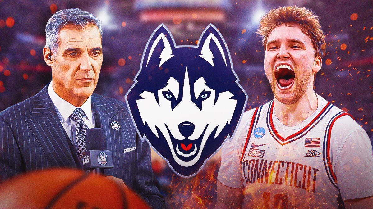Jay Wright stands next to UConn basketball's Cam Spencer after March Madness win over San Diego State