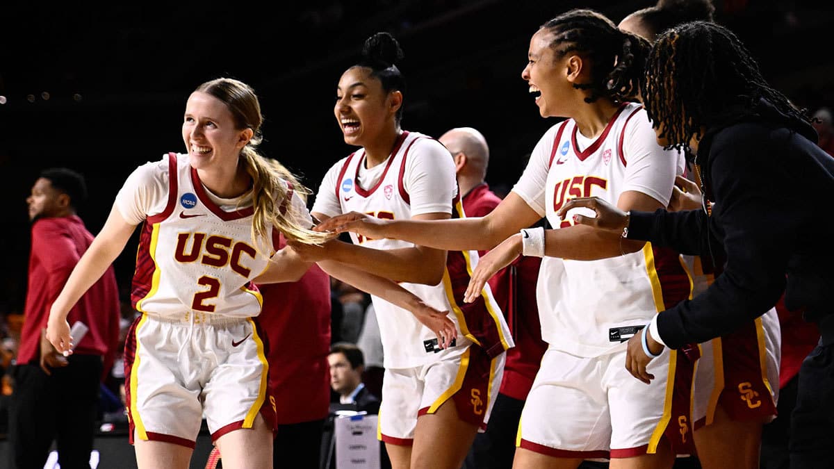 USC Trojans guard India Otto (2) celebrates scoring with teammates JuJu Watkins (12) and McKenzie Forbes (25) during an NCAA Womens Tournament 1st round game against Texas A&M-CC Islanders at Galen Center