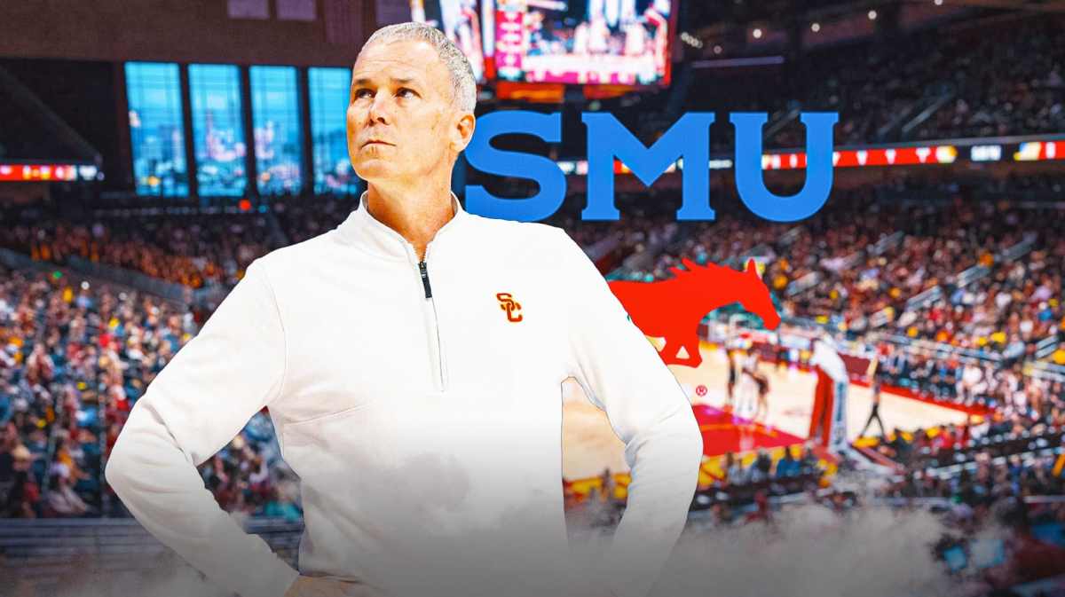 Andy Enfield with the SMU logo in the background, USC