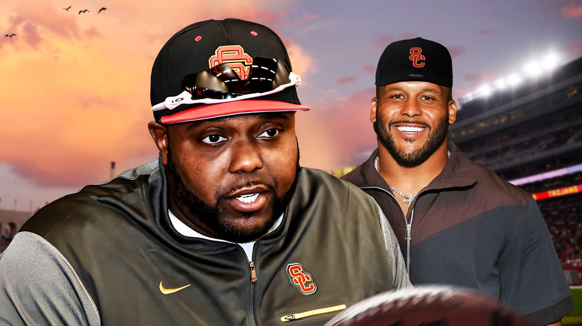 USC football coach Eric Henderson and Aaron Donald