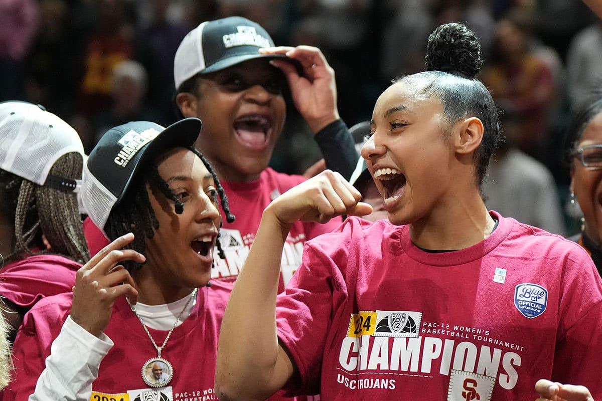Southern California Trojans guard Aaliyah Gayles (left) and guard JuJu Watkins (12) celebrate after the Pac-12 Tournament women's championship game against the Stanford Cardinal