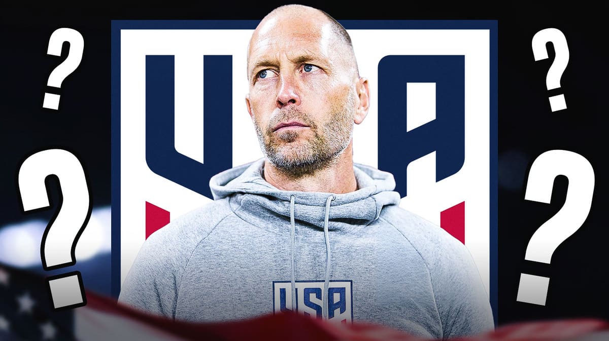 Gregg Berhalter in front of the USMNT logo, questionmarks in the air