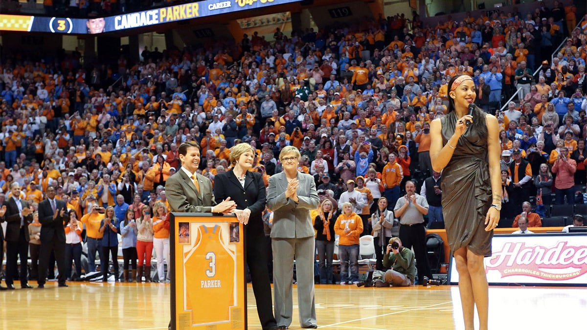 niversity of Tennessee athletic director Dave Hart (left) and Lady Vol former player Candace Parker (right) and head coach emeritus Pat Summitt (left center) and head coach Holly Warlick (right center) during the retirement ceremony of Parker's jersey before the game against the LSU Tigers