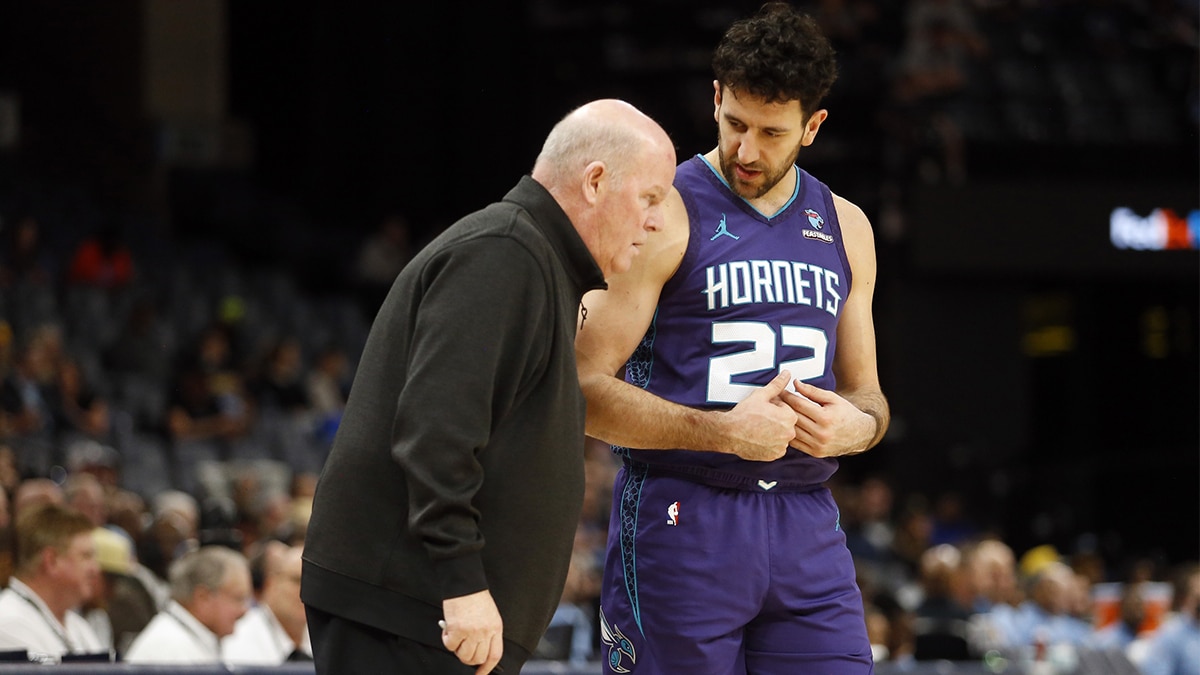 Charlotte Hornets head coach Steve Clifford (left) talks with guard Vasilije Micic (22) during the second half against the Memphis Grizzlies at FedExForum