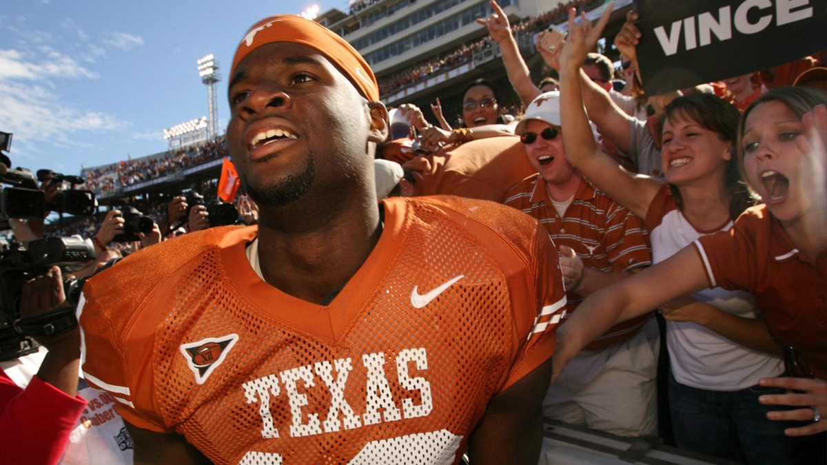 2003-2005: UT quarterback Vince Young celebrates wth the fans after beating OU 45-12 at the Red River Rivalry at the Cotton Bown in Dallas on Sat. Oct. 8, 2005.