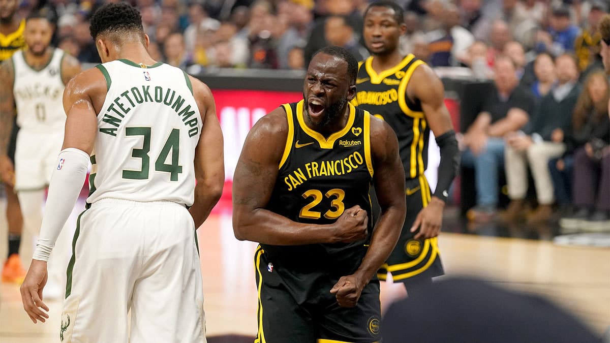 Golden State Warriors forward Draymond Green (23) reacts after being called for a foul against the Milwaukee Bucks in the first quarter at the Chase Center
