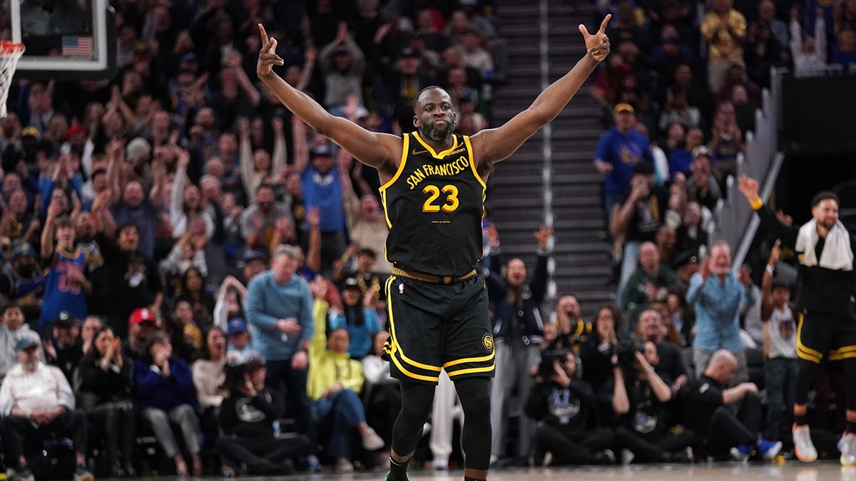 Golden State Warriors forward Draymond Green (23) reacts after making a three point basket against the Milwaukee Bucks in the fourth quarter at the Chase Center.